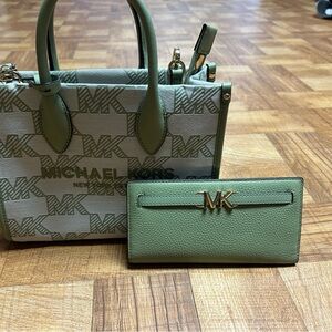 Michael Kors  light green shoulder bag with matching wallet.